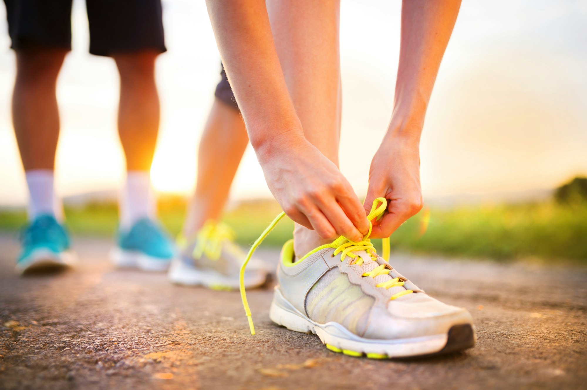 Couple running feet closeup